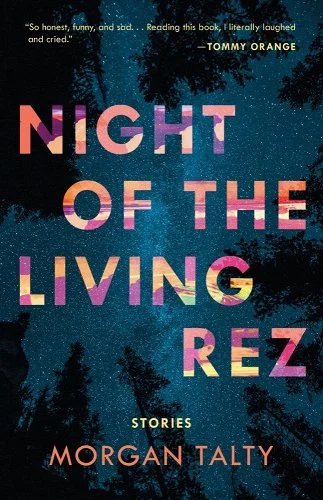 The cover for "Night of the Living Rez". It is a image of the starry night sky surrounded by black silhouettes of tree tops. The writing is in yellow, orange, red, and purple